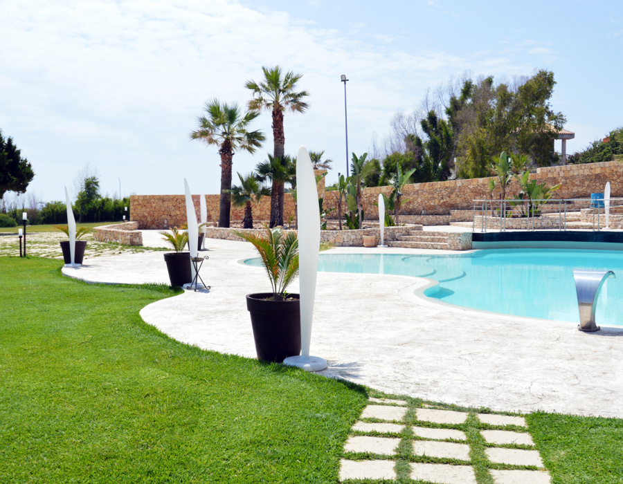 Plam Stampable, stamped concrete floor white color, tawny shades. Hotel Capo Campolato, Siracusa, Italy