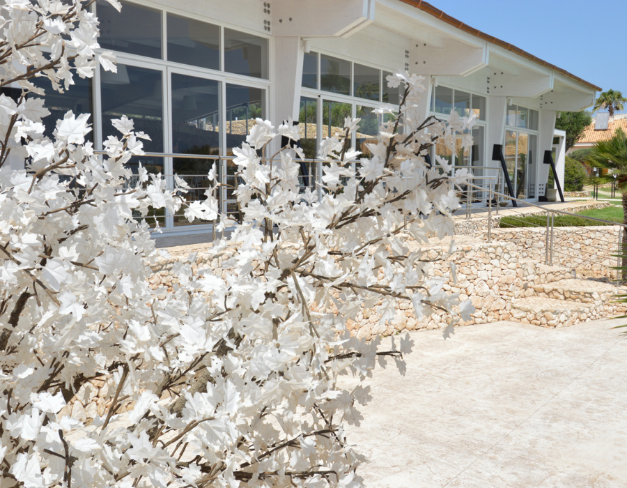 Plam Stampable, stamped concrete floor white color, tawny shades. Hotel Capo Campolato, Siracusa, Italy