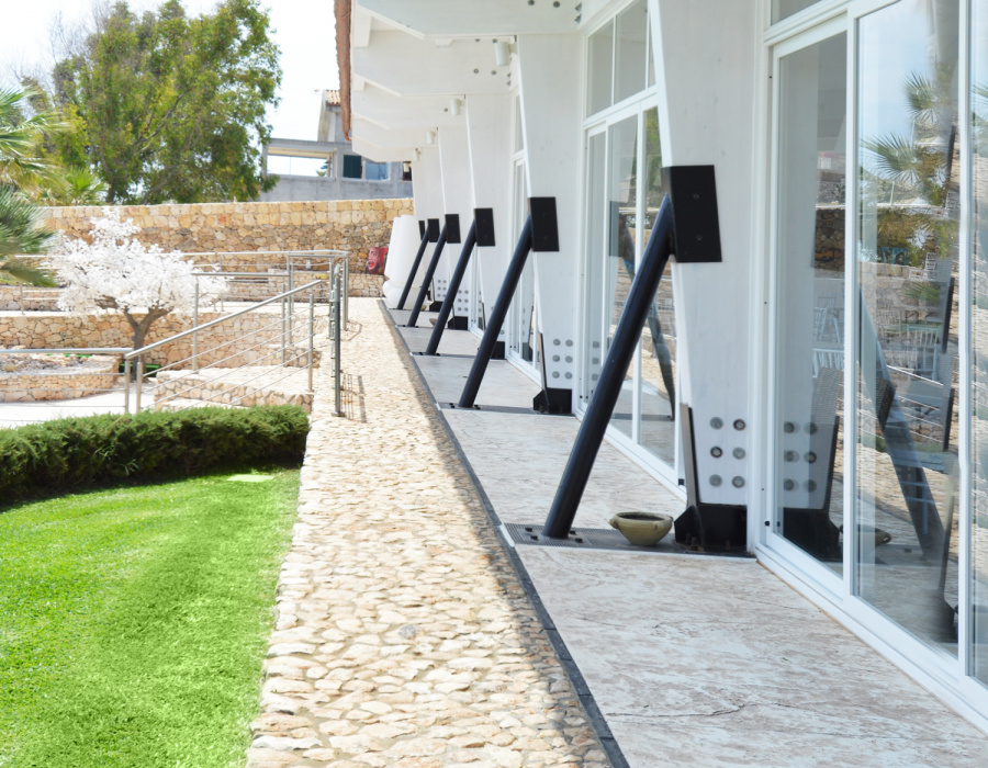 Plam Stampable, stamped concrete floor white color, tawny shades. Hotel Capo Campolato, Siracusa, Italy